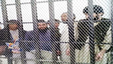 عدد من المتهمين بالإرهاب في المحكمة أمس